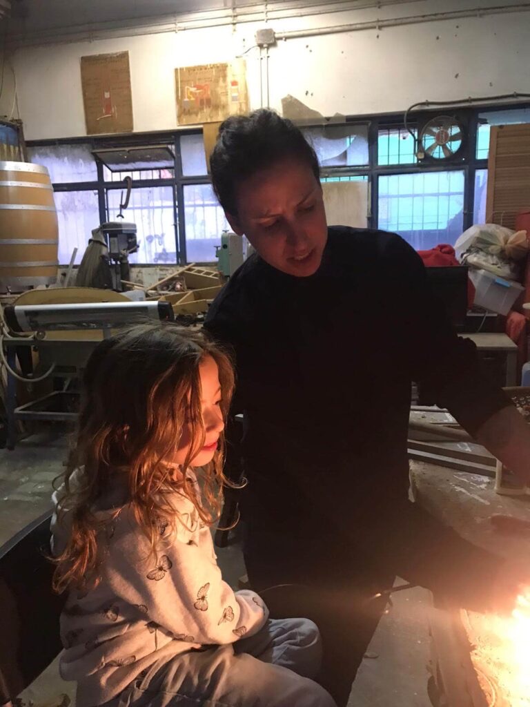 A child watching in the workshop