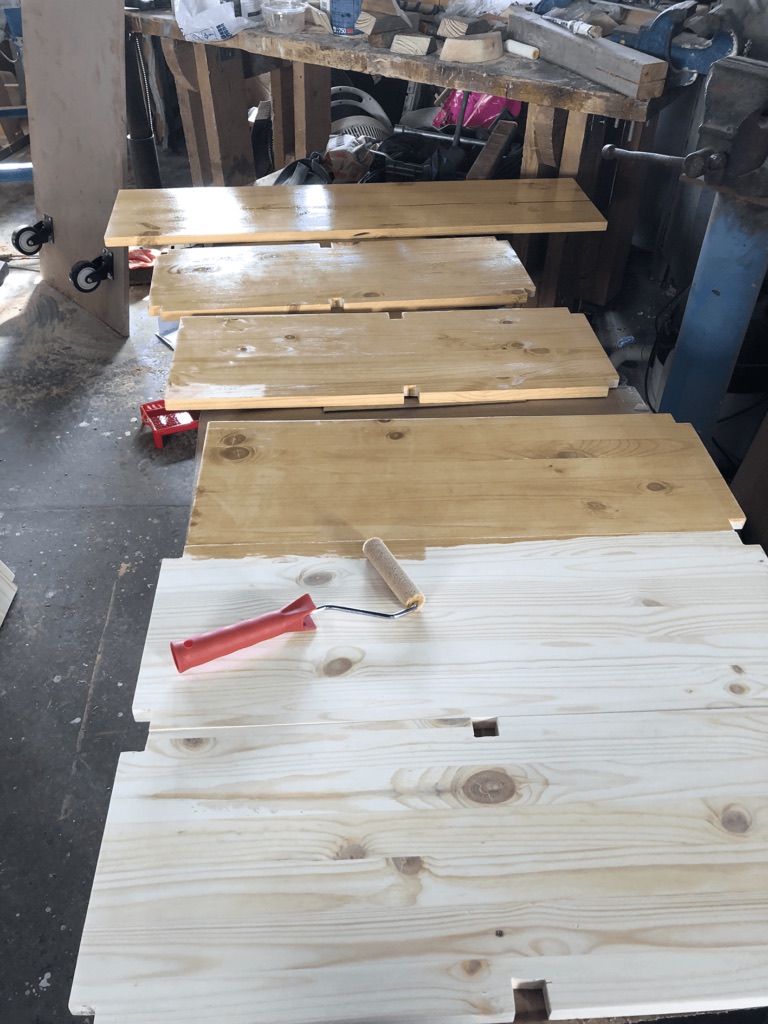 Pine tabletops being finished