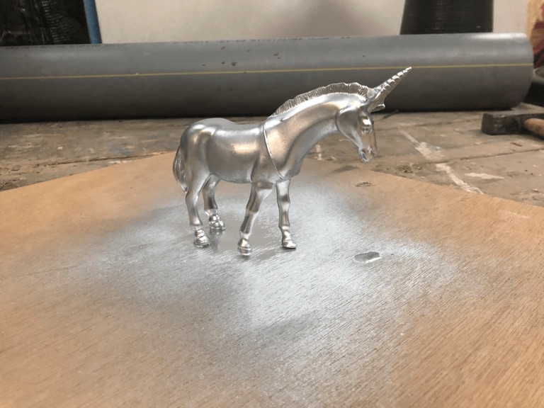 A silver unicorn figure